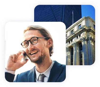 Foreign citizen on the phone discussing US nonresident tax filing, with a government building in the background.